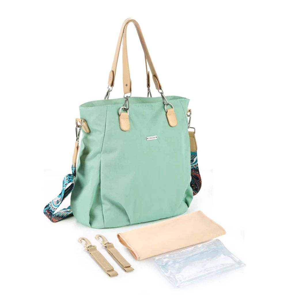 Le sac à langer chic avec compartiment vert menthe