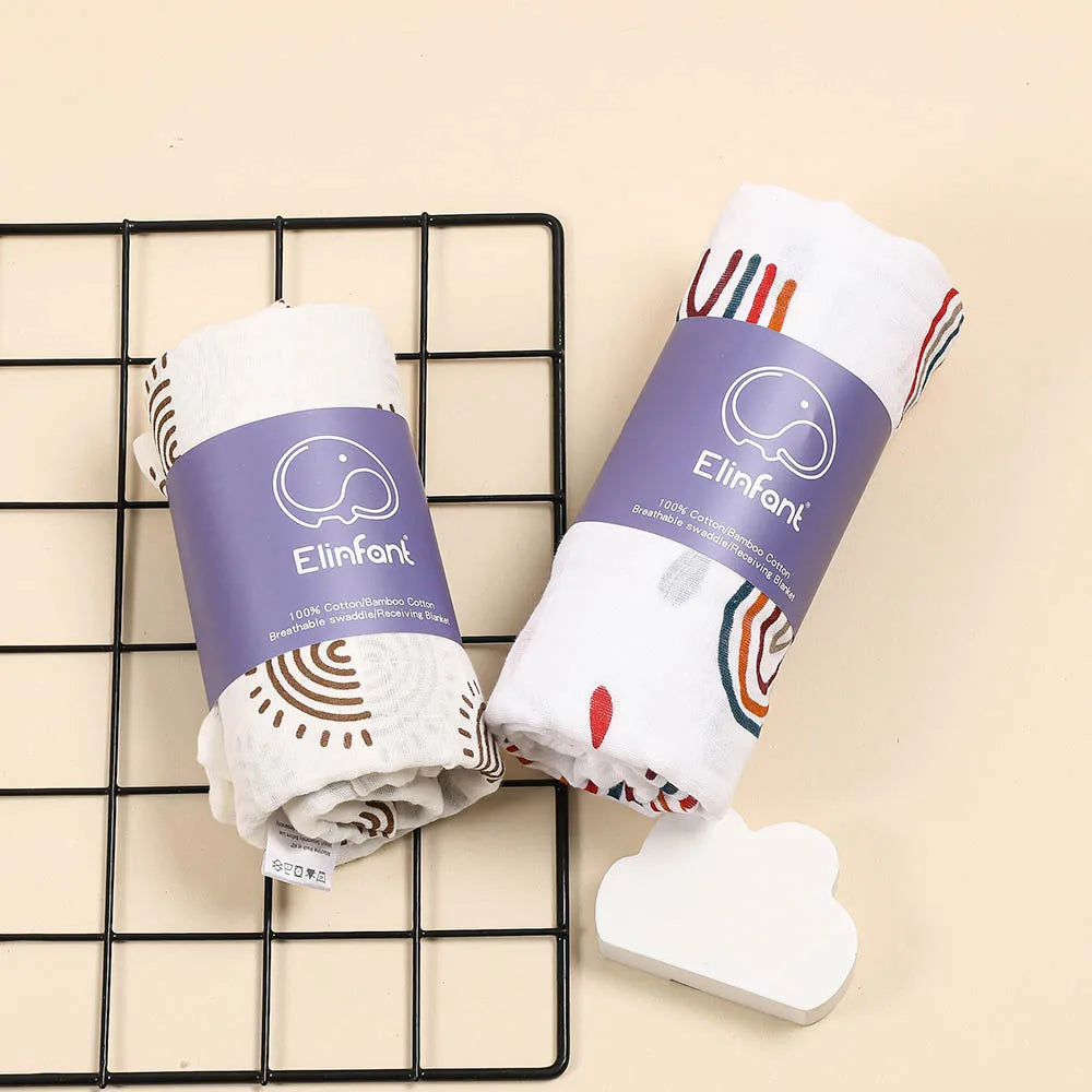 Lange bébé en mousseline de coton motifs geometrique