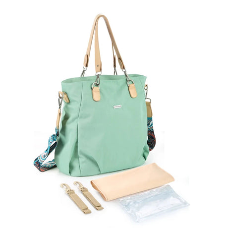 Le sac à langer chic avec compartiment vert menthe