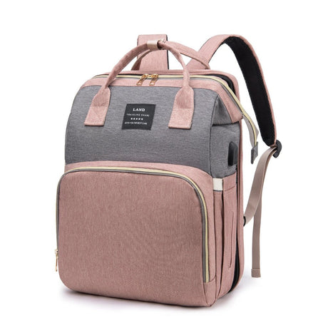 Sac à dos à langer lit nomade intégré Rose Gris